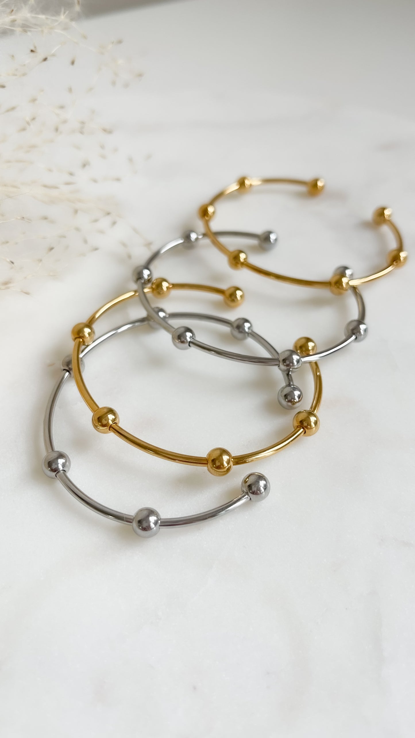 Silver and gold bangles (set)