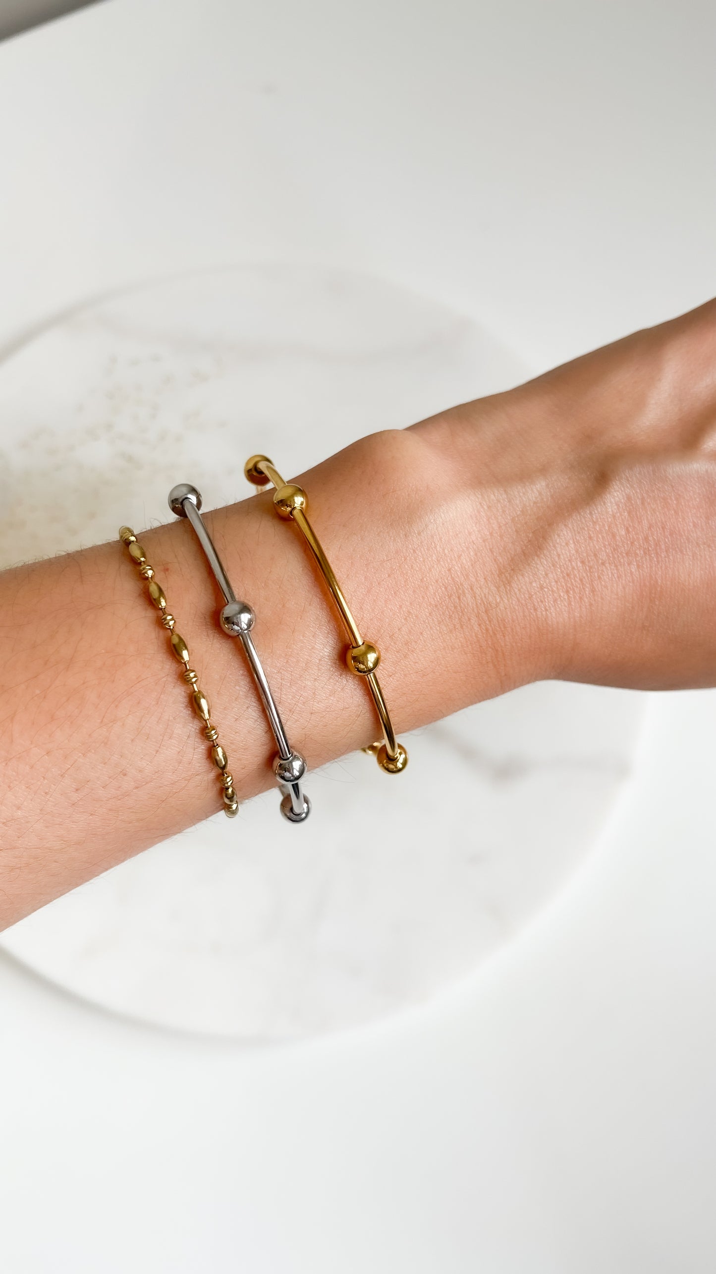 Silver and gold bangles (set)