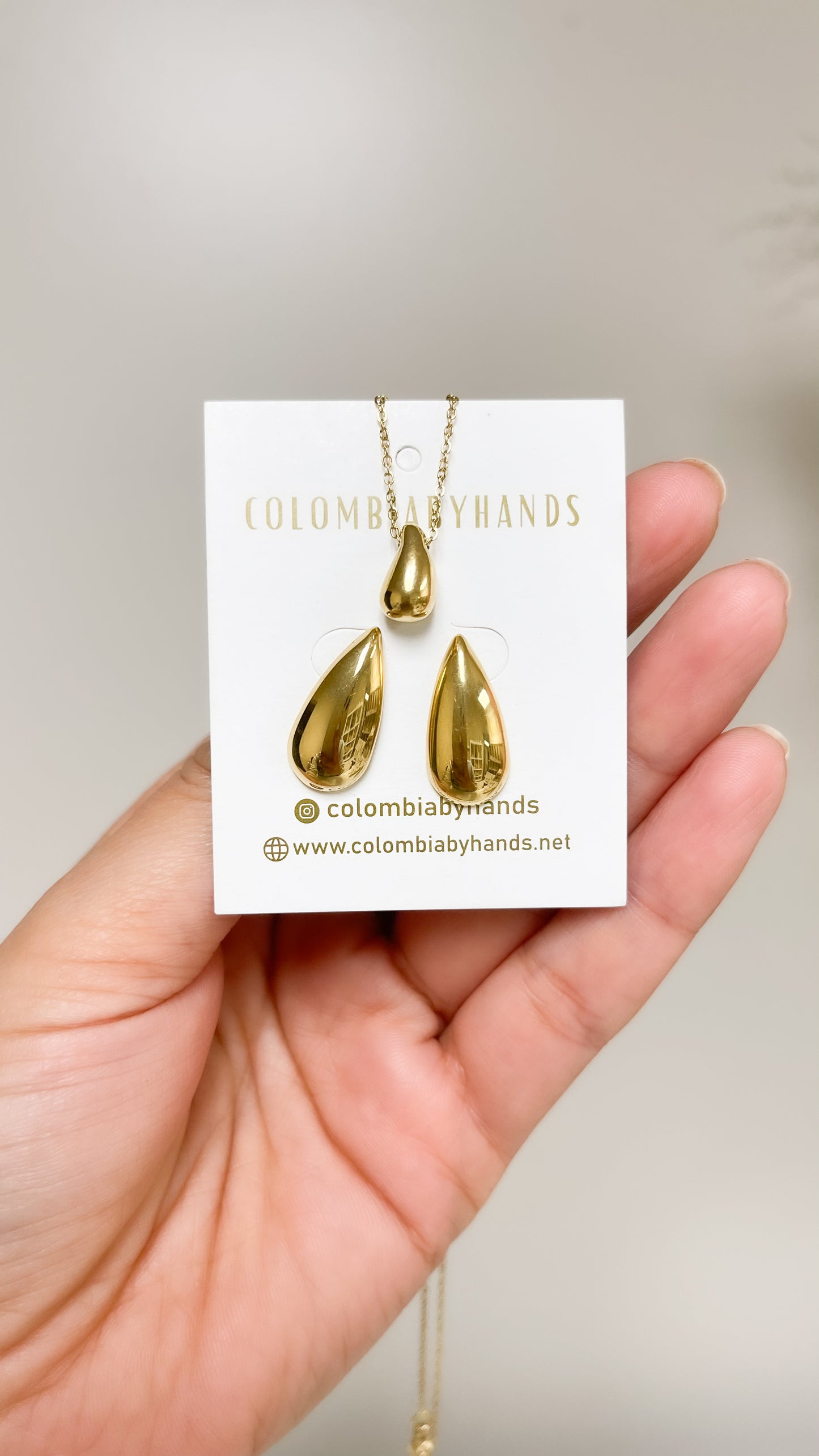 Dainty drop gold